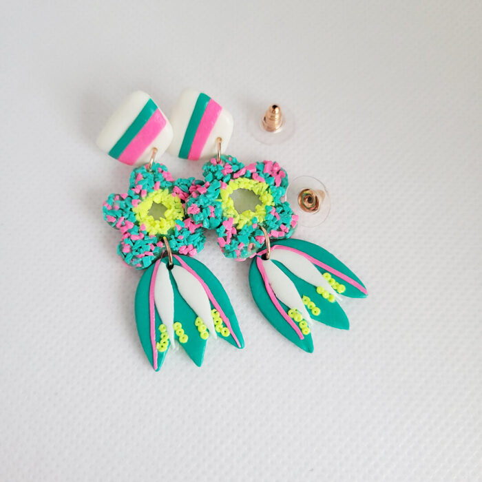Author's naive handmade earrings from ecological materials.