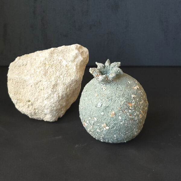 Decorative blue pomegranate with pieces of seashells
